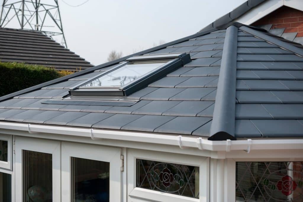 Replacement conservatory roof installed on a home in Chesterfield, Derbyshire, featuring modern energy-efficient design for improved year-round comfort.
