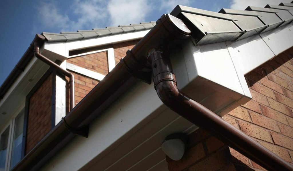 Professional fascia and soffit installers working on a residential property in Alfreton, Derbyshire" Would you like variations for different types of images, such as close-ups, before-and-after shots, or team photos?